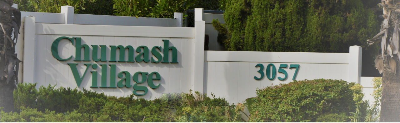 sign of entrance at 3057 Higuera St.